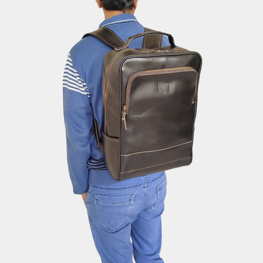 A guy in blue sweatshirt posing with Black Grampians Leather backpack By The Leather Bag Australia TLB