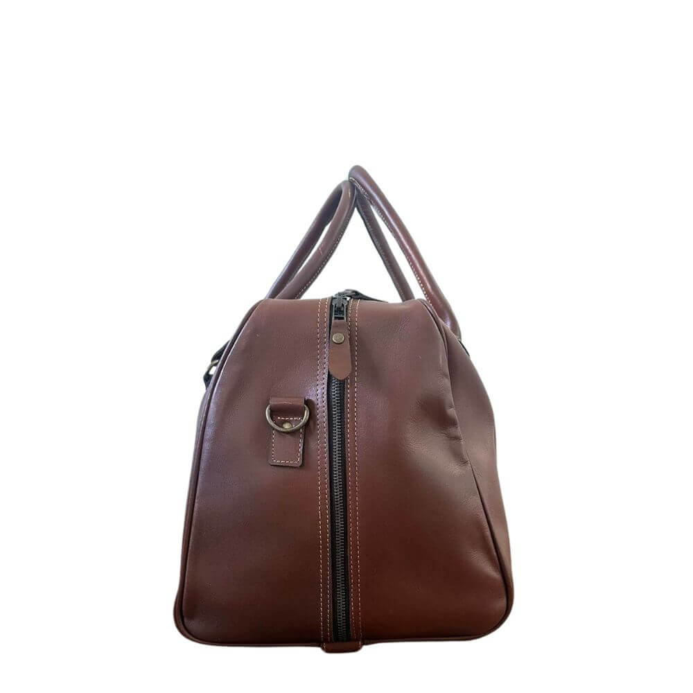 Side view of the Aussie Traveller brown leather duffle showing brass hook and YKK zipper