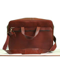 Nomad Essential Leather  Messenger Bag showing spacious organization zip[per pocket and adjustable leather strap attached