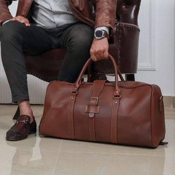 Model posing with The Aussie Traveller Duffle Bag