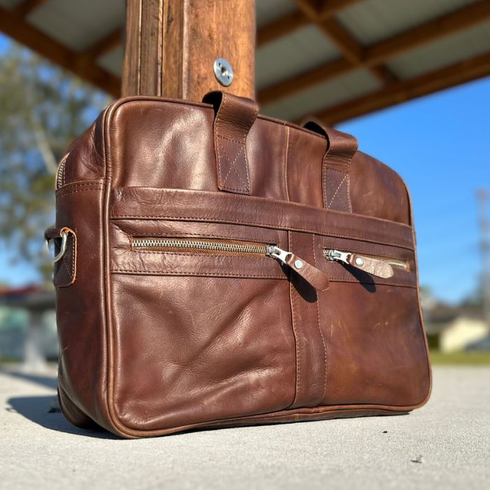 The Tech Savvy Leather Messenger Bag in outdoor setting of Australian Landscape