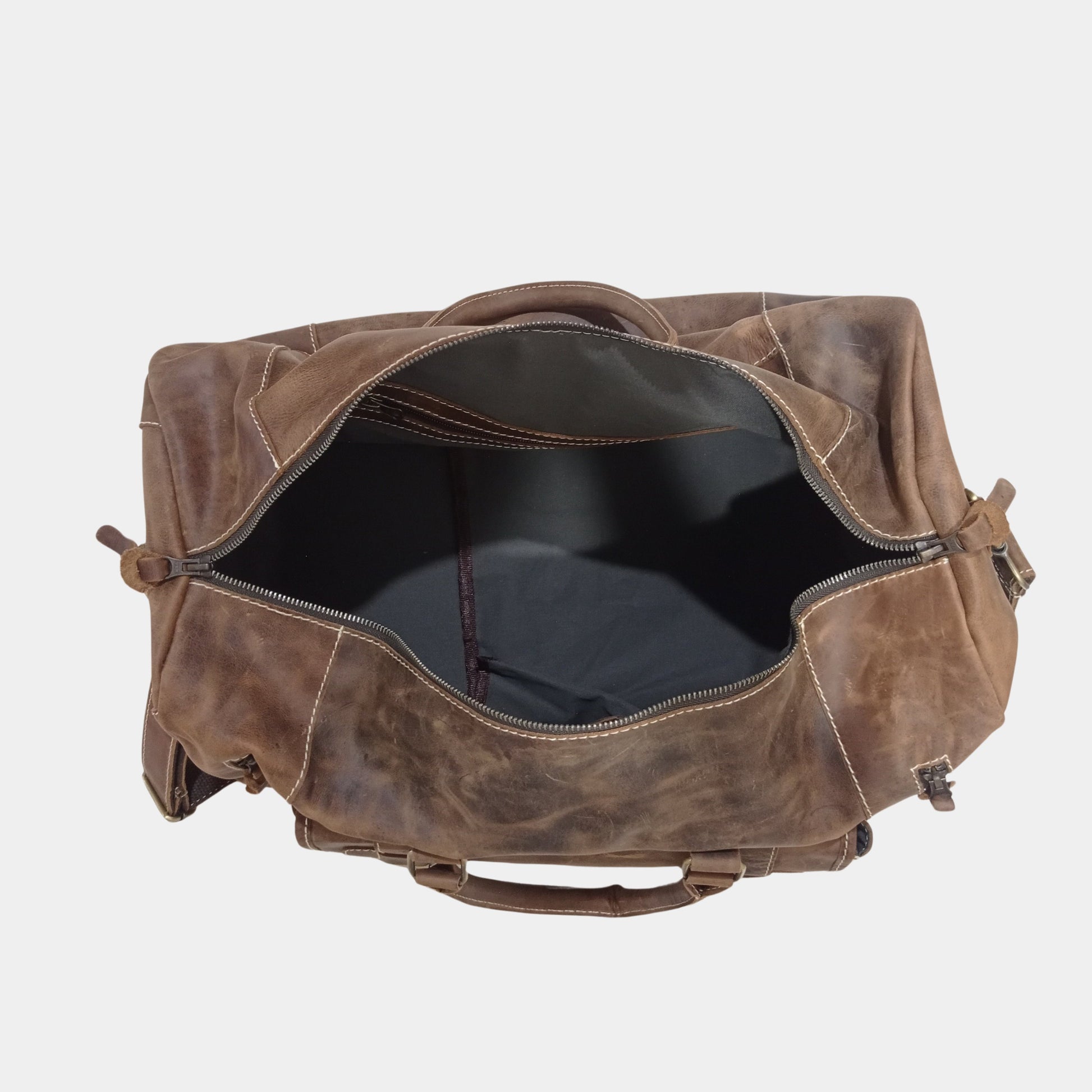 Inside view of Roma Leather Duffle bag showcasing its soft cotton lining