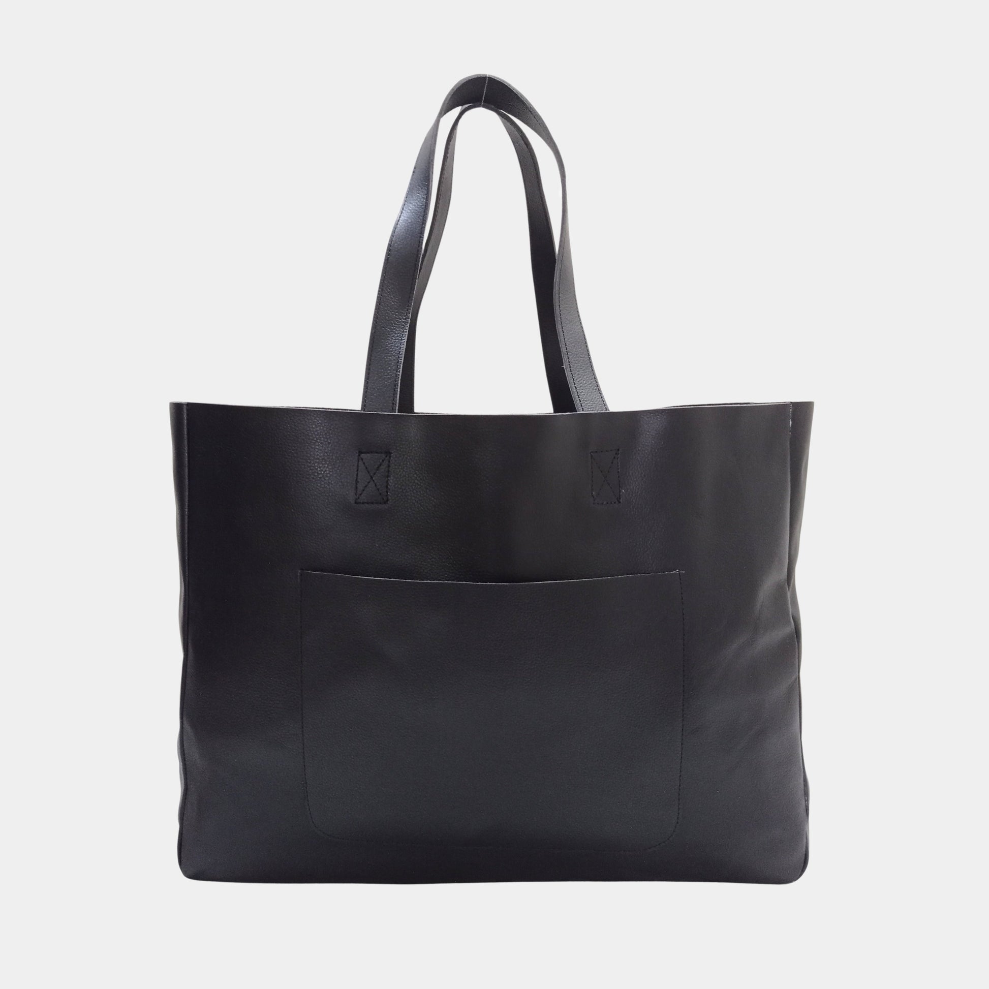 Black tote bag on a light gray background