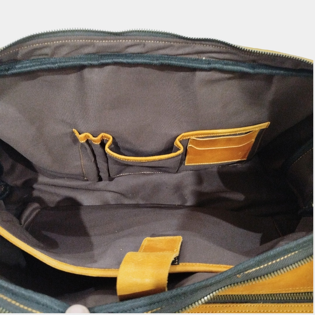 close up shot of Organization slip pockets inside outback explorer duffle bag for card, pens and electronic gadgets