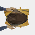 Inside view of Outback Explorer Duffle Bag showing dark brown cotton interior 